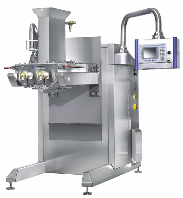 Strand forming machine for creamy mixtures