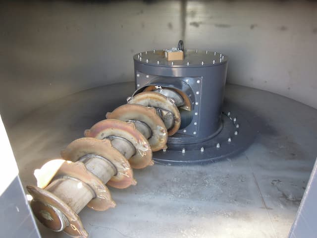 Solid biomass boiler feeding systems