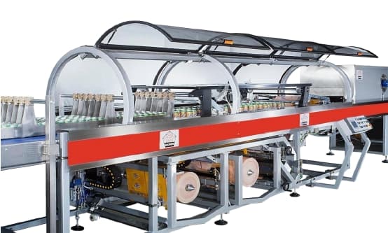Shrink wrapping machine for PET bottles
