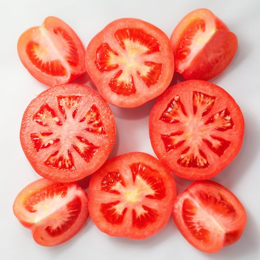 red tomato halves isolated