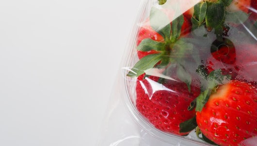 ripe-strawberries-plastic-package-white-background-delicious-fresh-berries-container-sale-customers-keeping-food-fresh-healthy-food-vitamins-microelements
