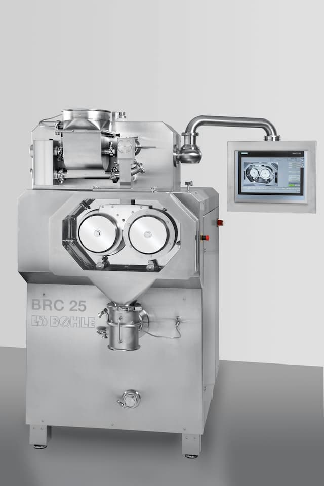Continuous roller compactor for dry granulation of pharmaceuticals