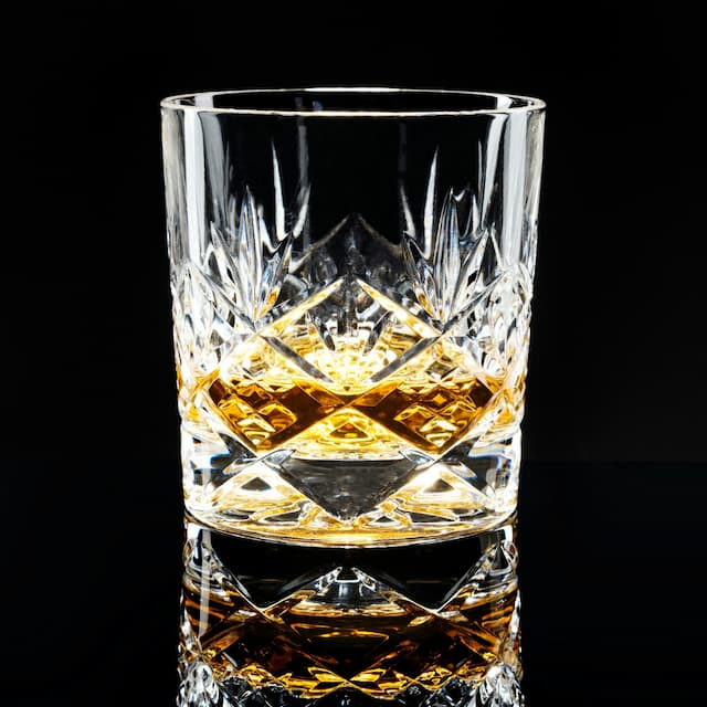 golden-scotch-whisky-black-background