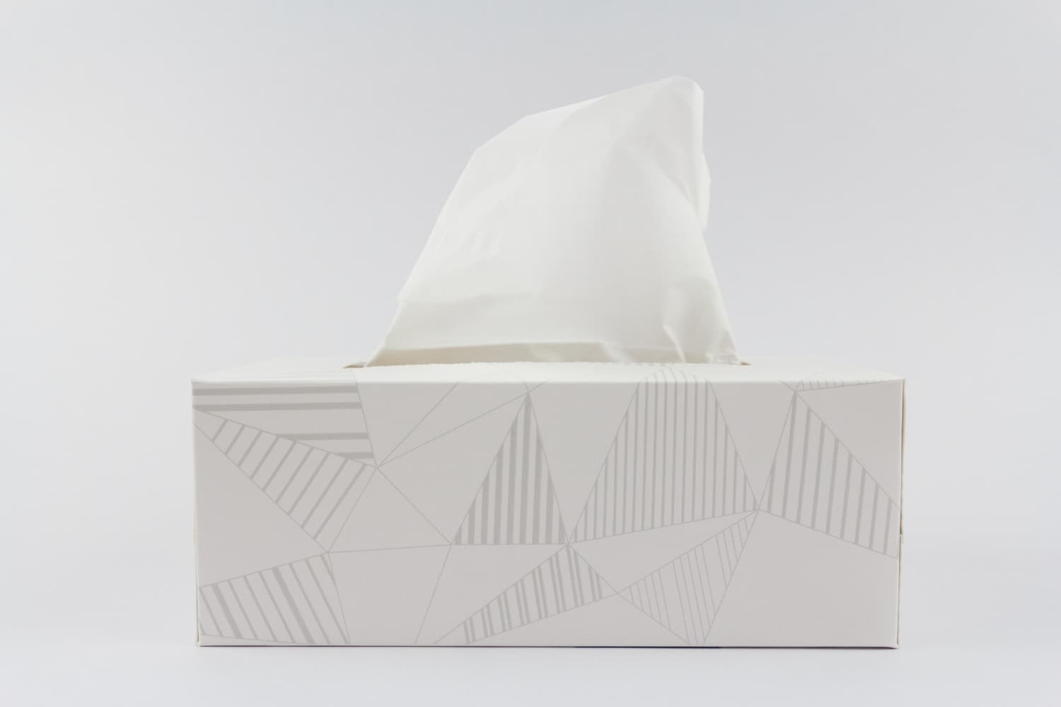white tissue paper box against a grey background