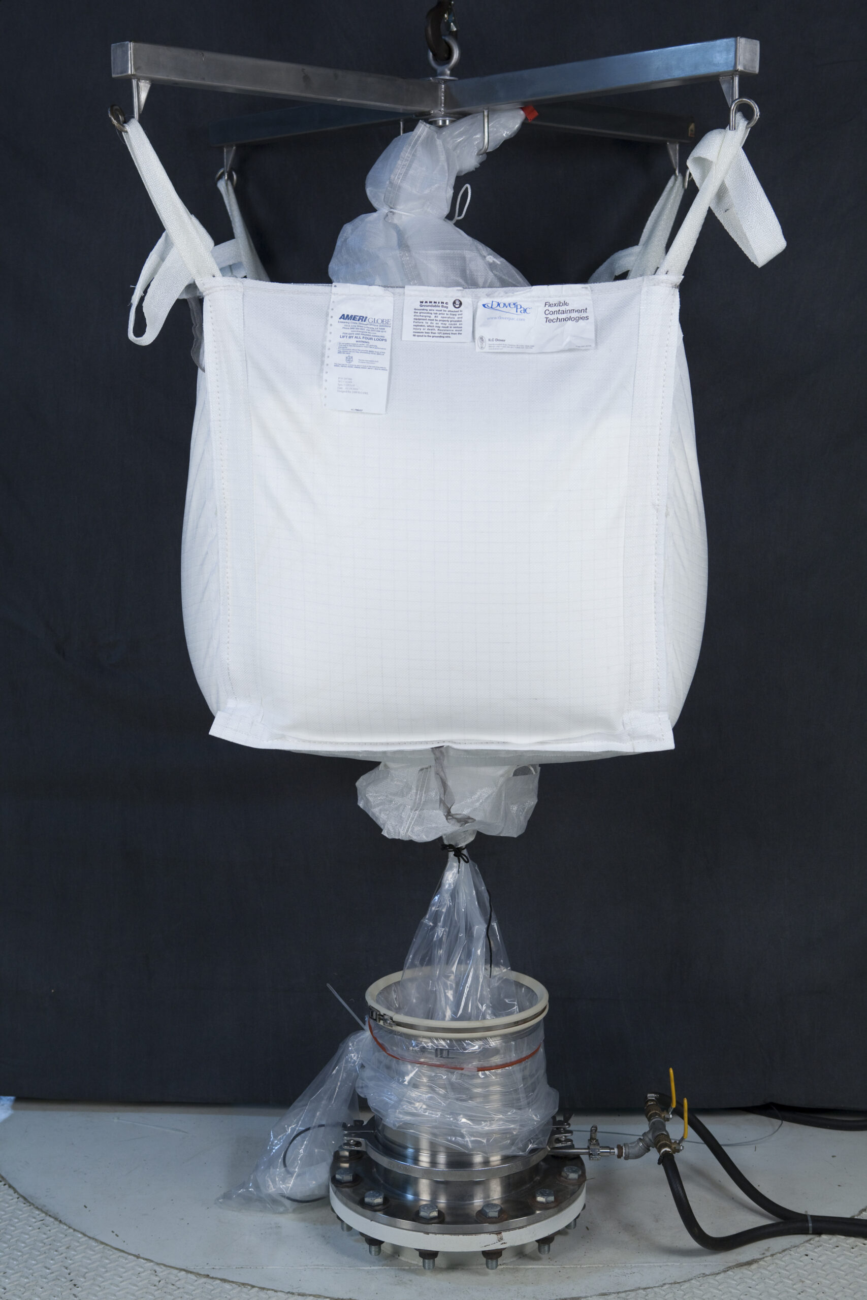 Flexible contained powder charging solution