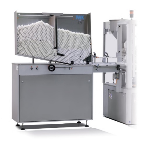 Tube feeding unit for high volume and high speed tube filler