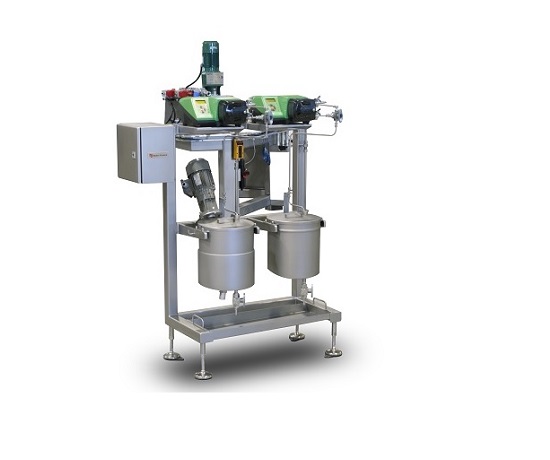 In-line colour or flavour addition for confectionery