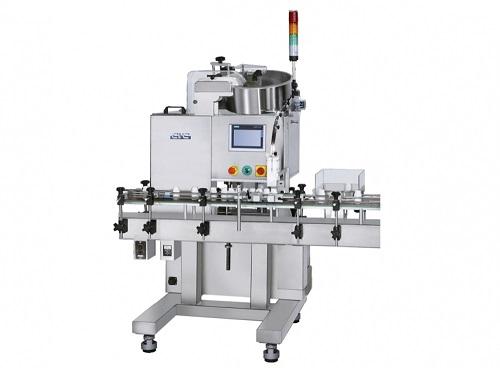 Dessicant inserting machine