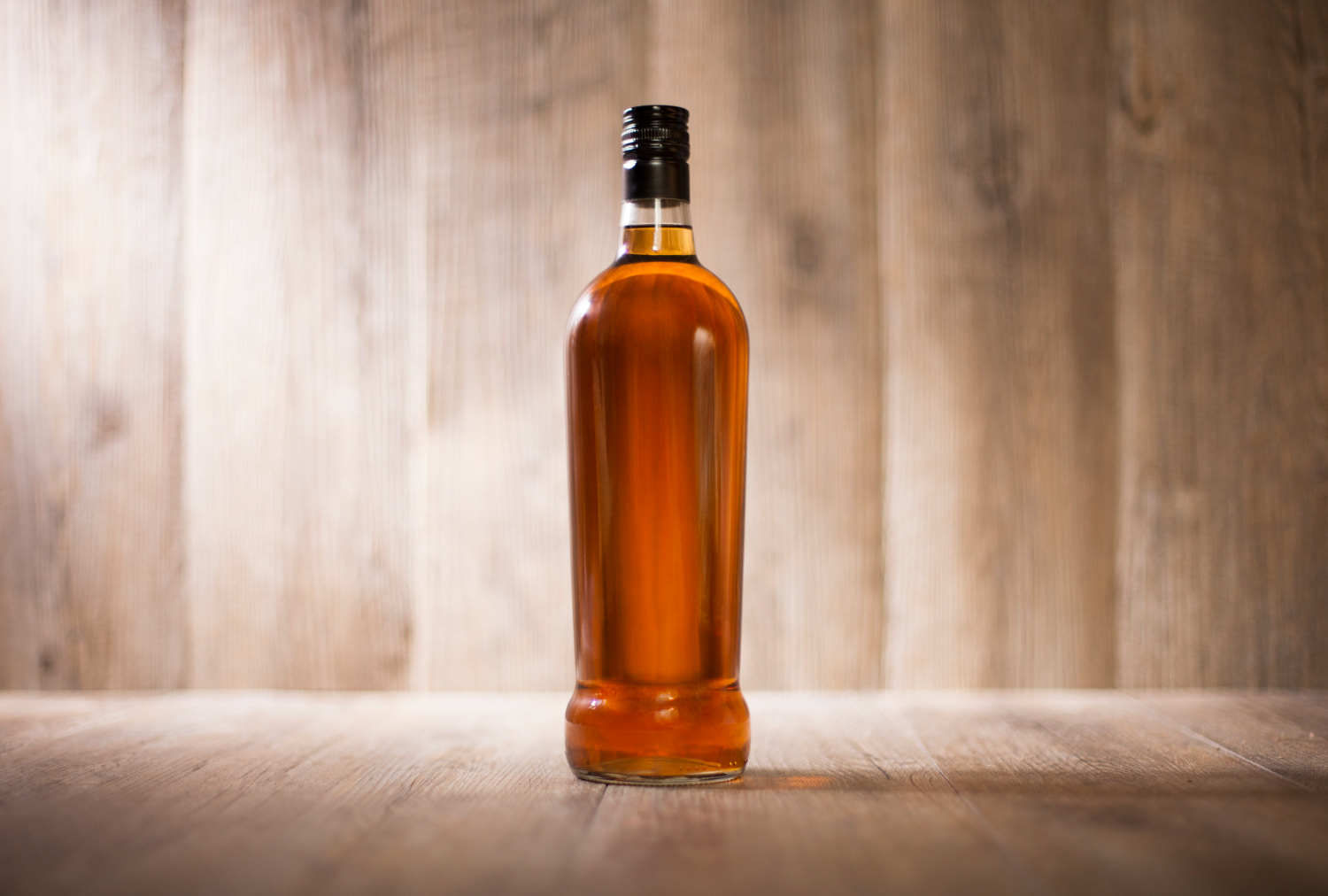 rum bottle on a wooden surface