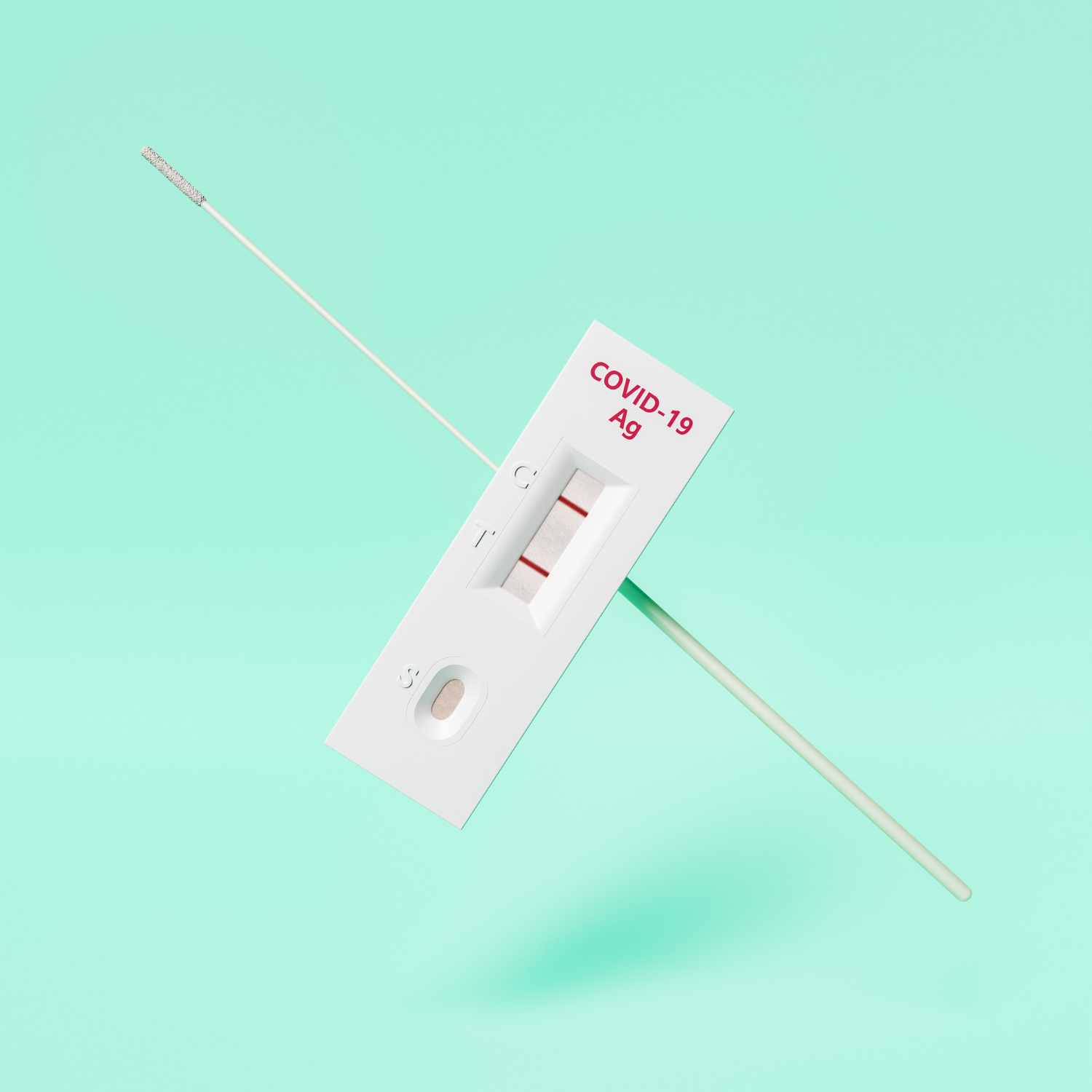 suspended covid later flow test kit against green background