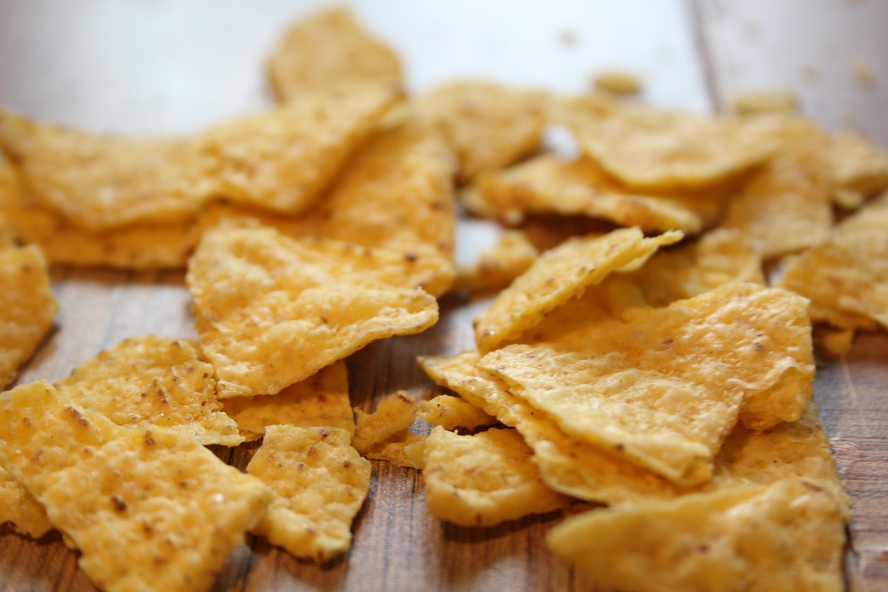 Corn cooking systems for tortilla chips