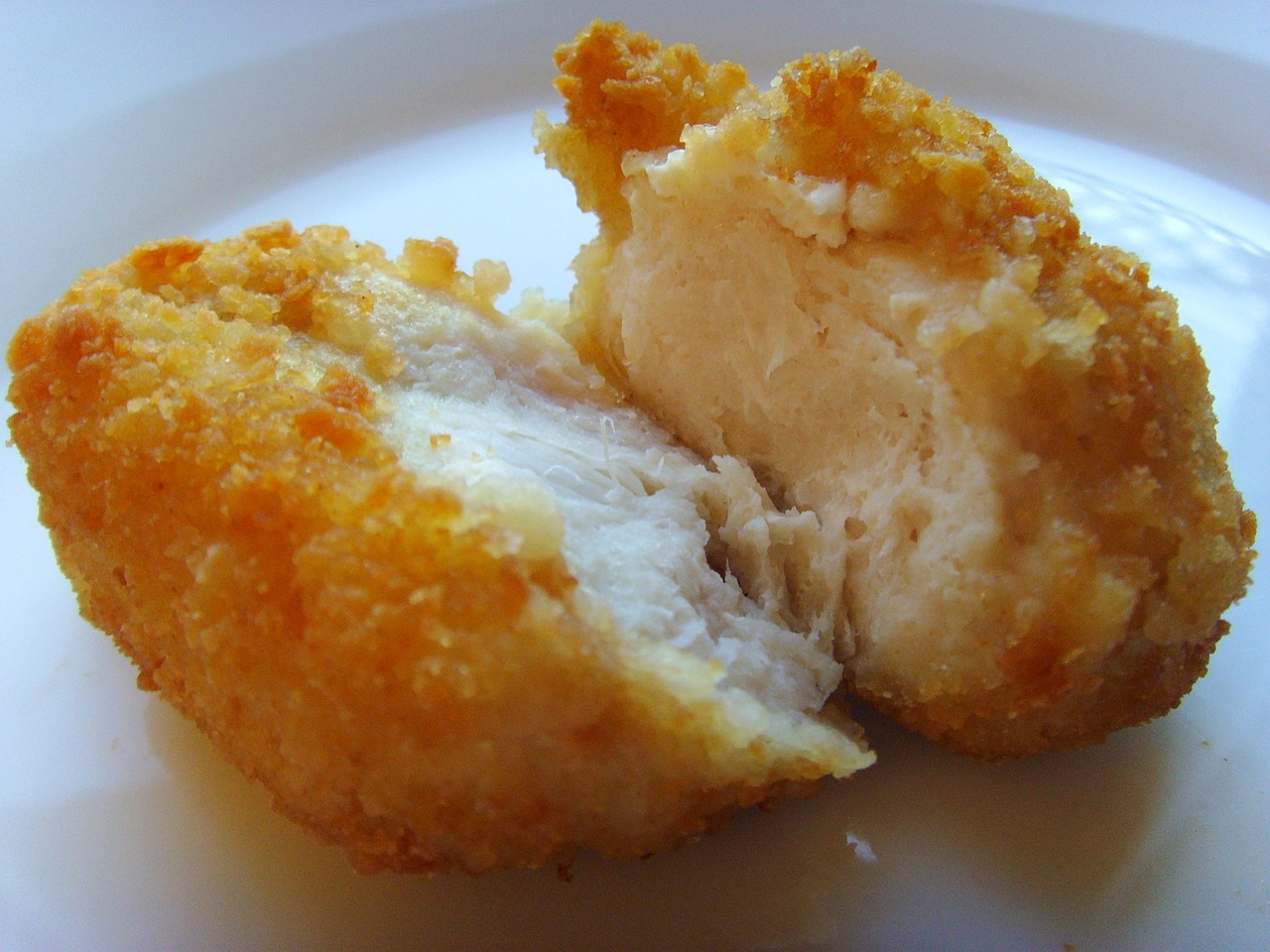 Compact continuous fryer for food service applications