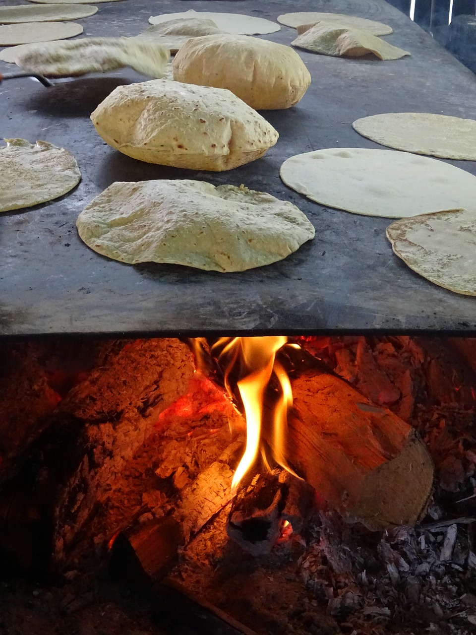 Corn cooking systems for tortilla chips