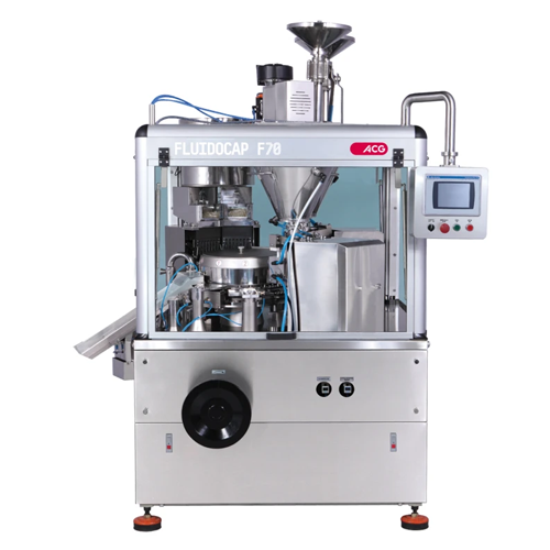 Liquid filling system for hard capsules