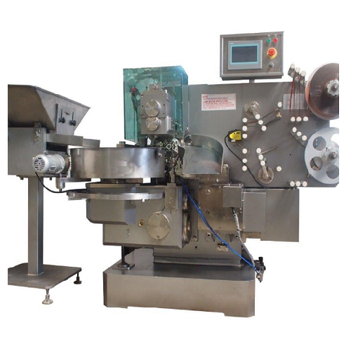 Double twist wrapping machine for sweets