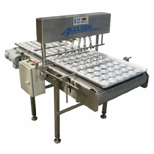 Auto bakery tray depositor for creams and batters