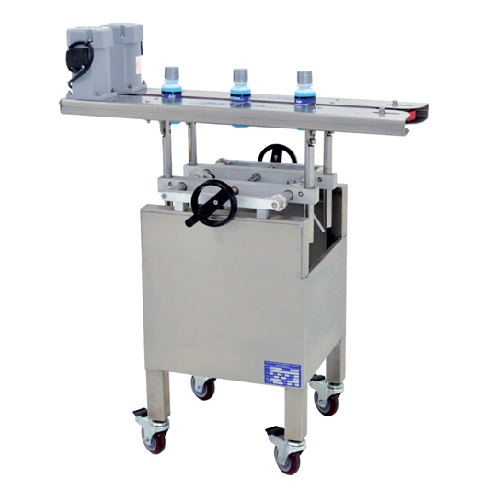 Bottomless conveyor for 90° bottle transfer and coding