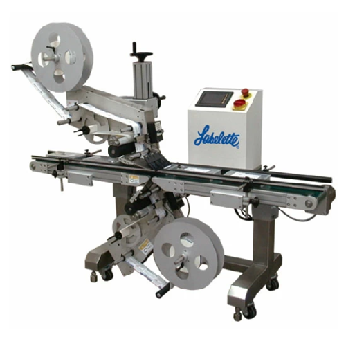 Dual head labeler for top and bottom label applications