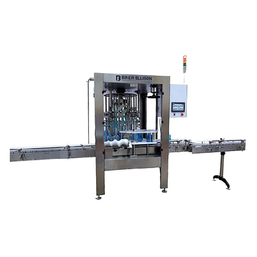 Rotary overflow filler for non-carbonated liquids