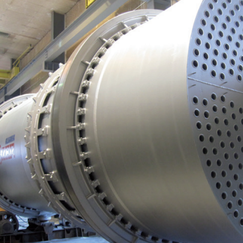 Indirect cooling drums for process heat recovery