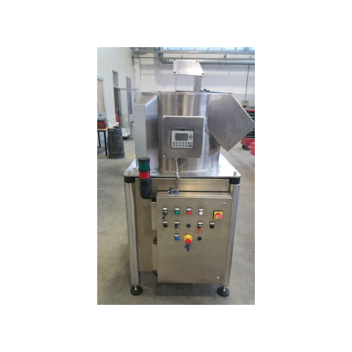 Centrifugal separator for reworking chocolate and chopped hazelnuts
