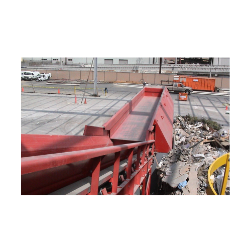 Vibrating feeder for sorting system