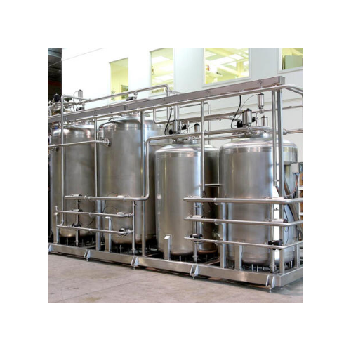 Ion exchange system for fruit juices and syrups