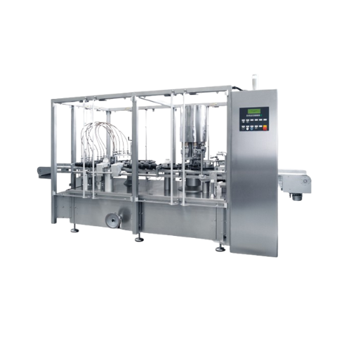 Continuous motion liquid filling and capping monobloc