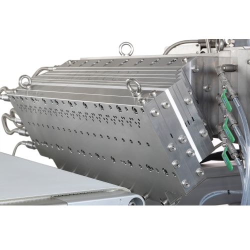 Extrusion system for color changing confectionery strands