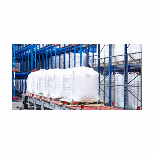 Stationary entry packaging system for valve bags