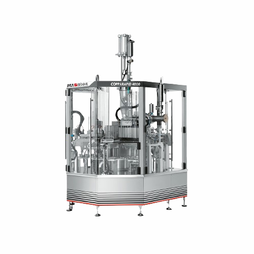 Rotary filling and sealing system for pasty products