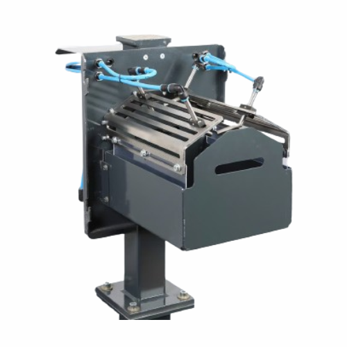 Adhesive nozzle cleaning system for automotive production