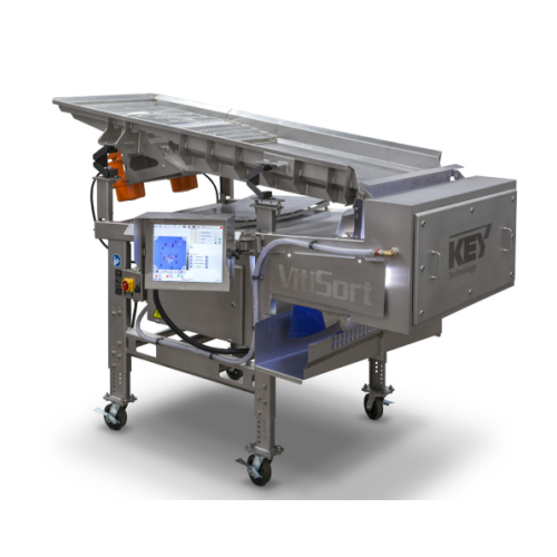 Vibratory conveyor for efficient bulk material transportation