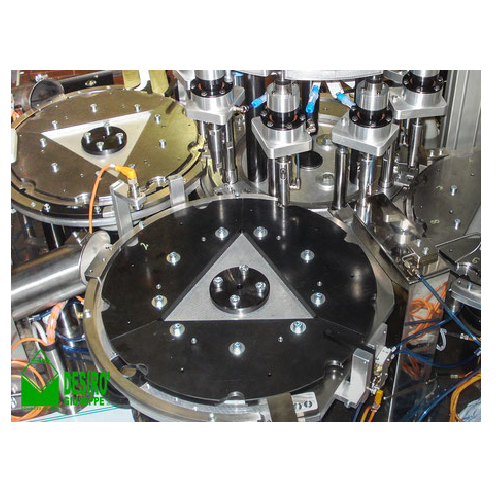 High speed assembly system for caps and closures