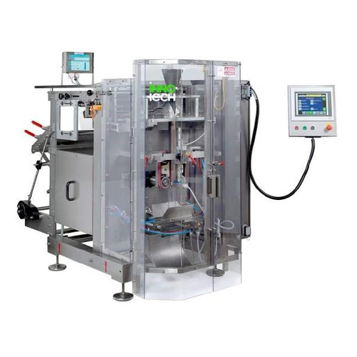 Vertical fill and seal bagging machine for bakery products