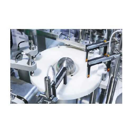 Robotic syringe filling system for sterile pharmaceutical production