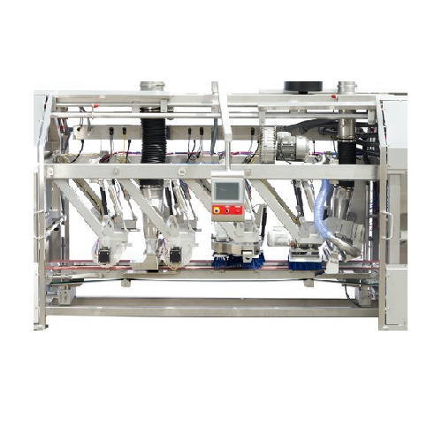 Continuous pan cleaner for bakery pans