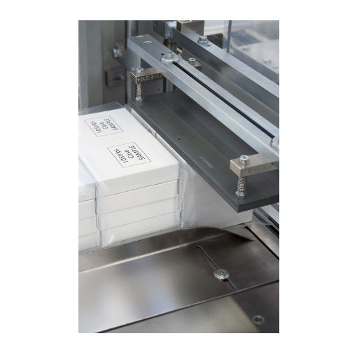 Automatic bundling machine for cartons and bottles