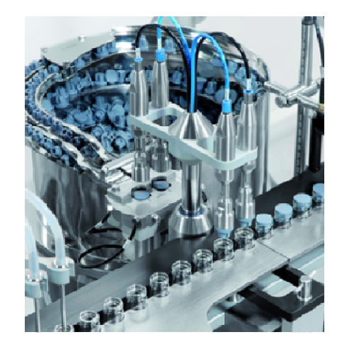 Automatic linear filling stoppering system for large volume vials