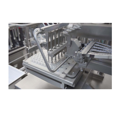 Nested syringe filling and stoppering system