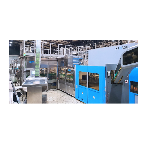 Integrated rotary blowing and filling system for Pet bottles