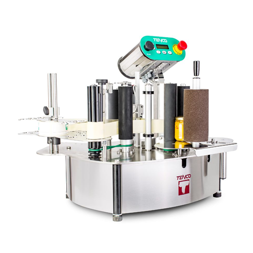 Self-adhesive label applicator for cylindrical and shaped bottles