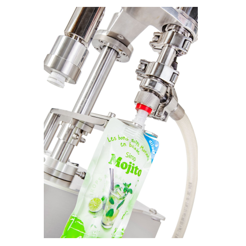 Manual monoblock for filling and capping spouted pouches