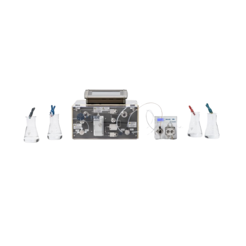 Continuous flow hydrogenation reactor for corrosive reagents