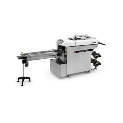 Automatic stretch film wrapper for trays