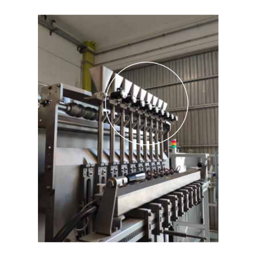 Continuous impact vibrators for bulk solids discharging