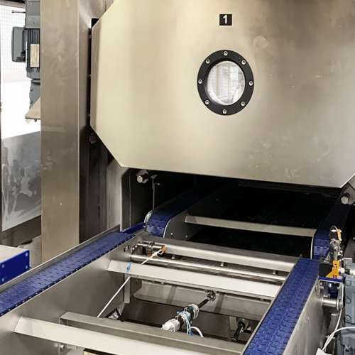 Vacuum cooling system for baked goods