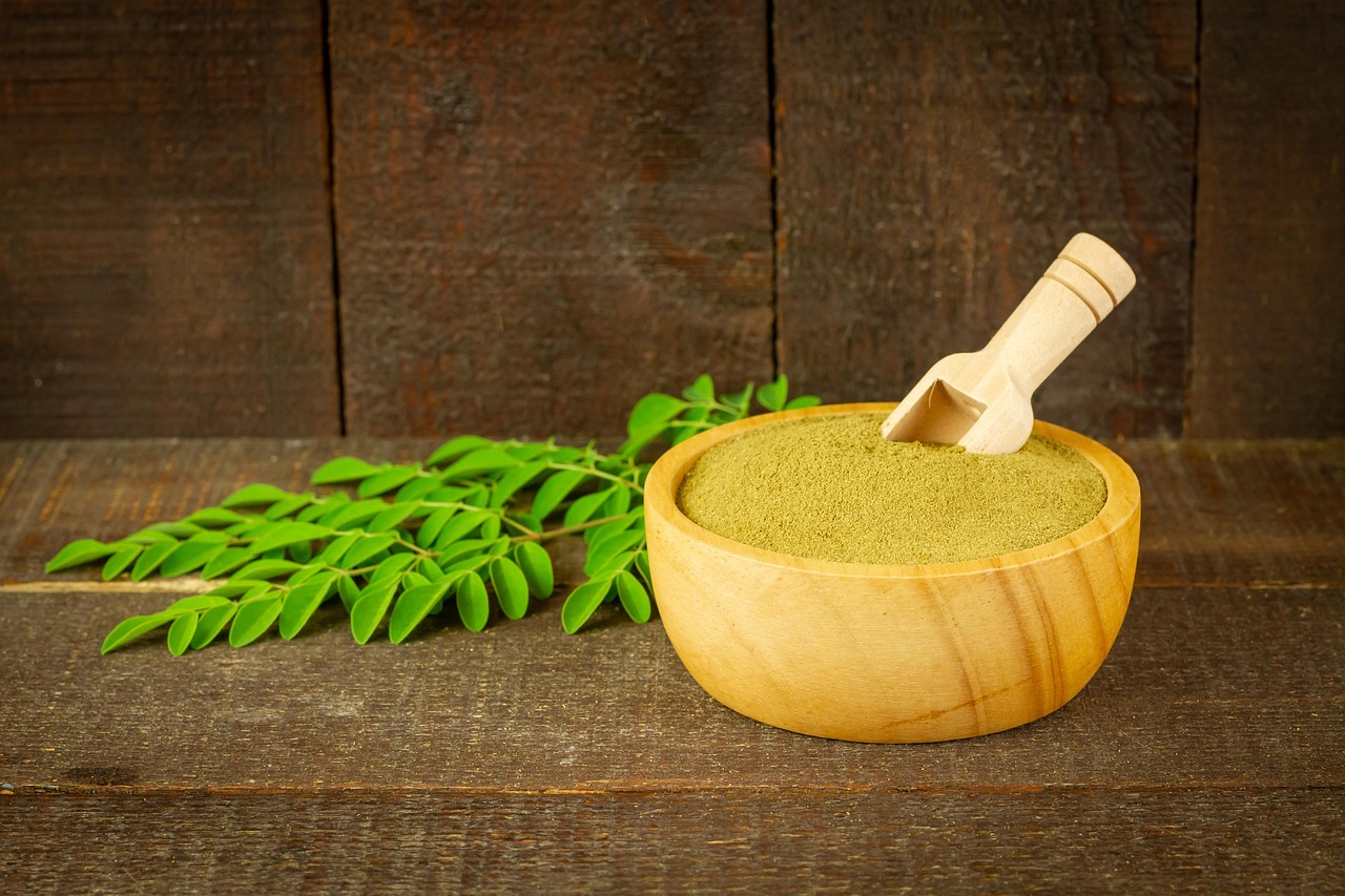 moringa, powder, leaves, moringa oleifera, super food, healthy, vitamins, nature, herbal, supplement, organic, wooden bowl, rustic, closeup