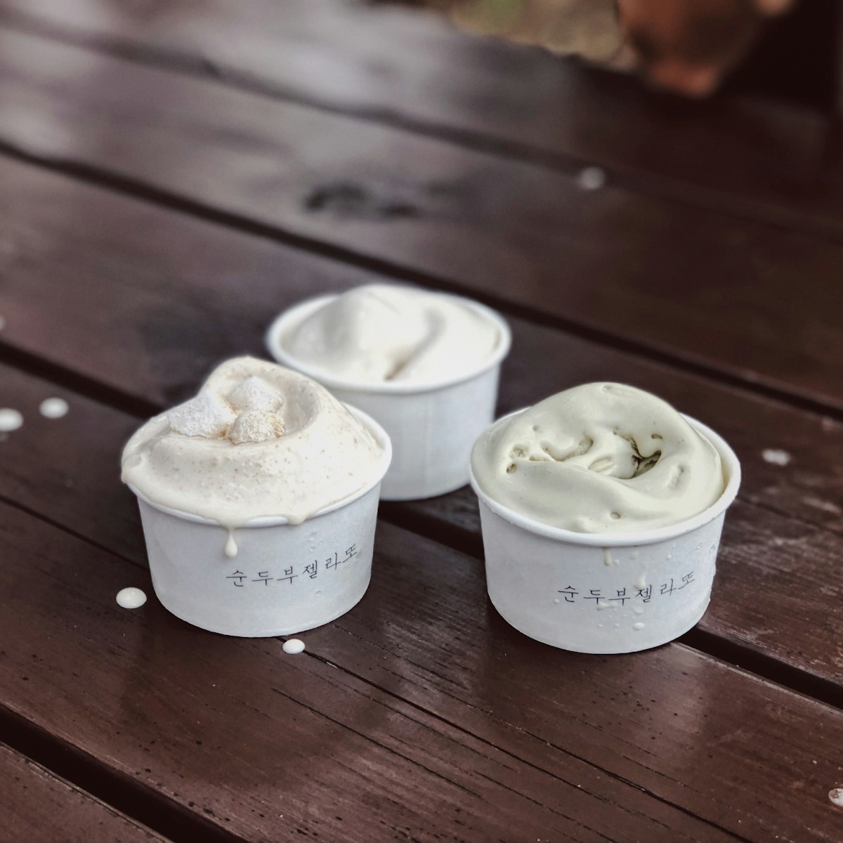 three white cups