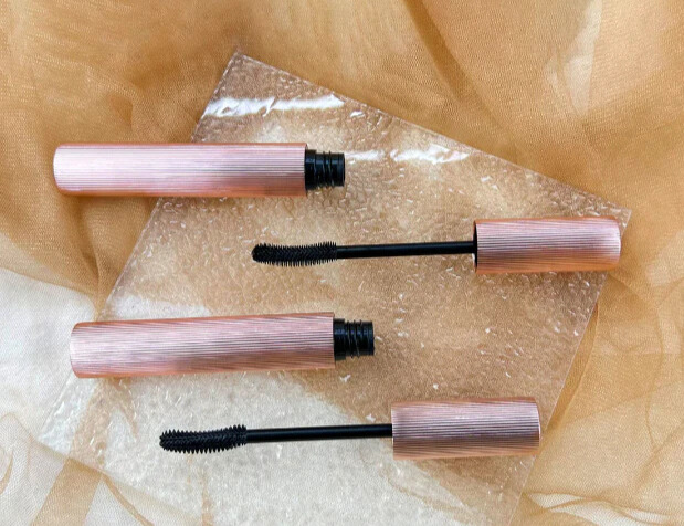 Mascara and lip gloss filling and capping system